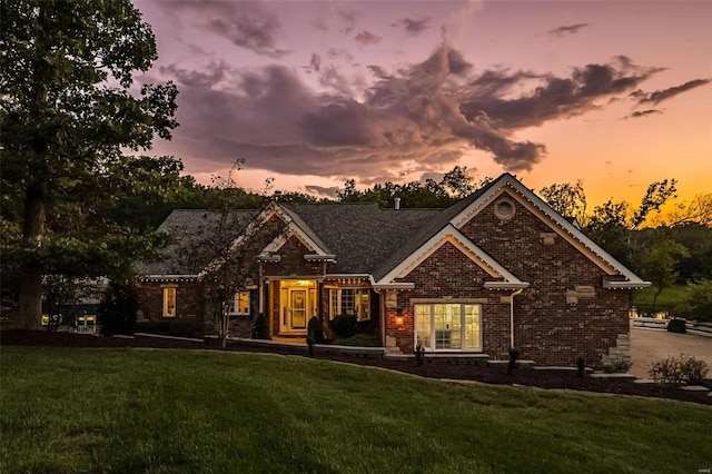 view of front of home with a yard