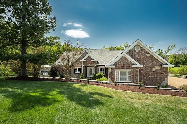 view of front of property with a front yard