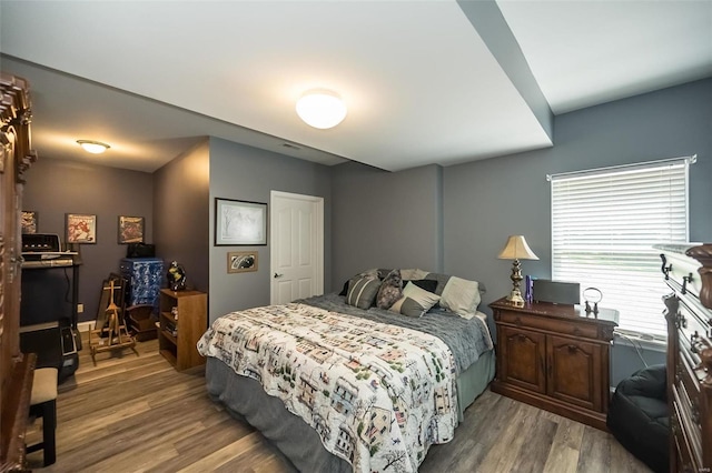 bedroom featuring light hardwood / wood-style floors