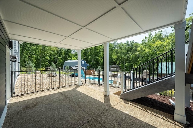 view of patio / terrace featuring a community pool