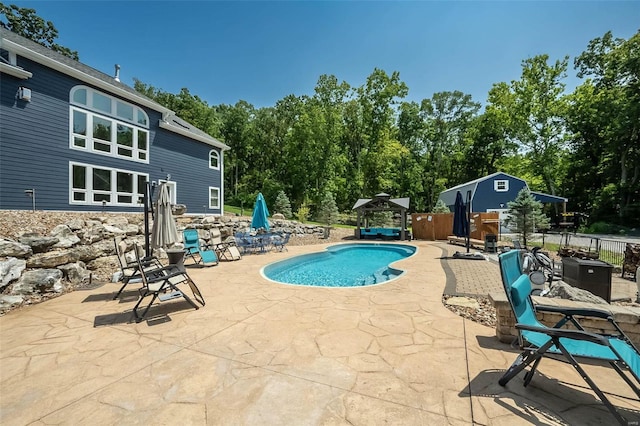 view of swimming pool featuring a patio