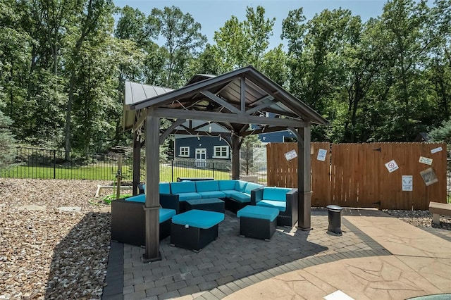 view of patio / terrace featuring a gazebo and an outdoor hangout area