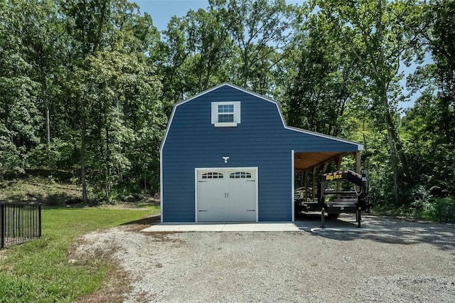 garage featuring a carport