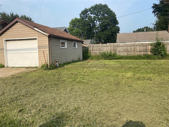 view of yard with a garage