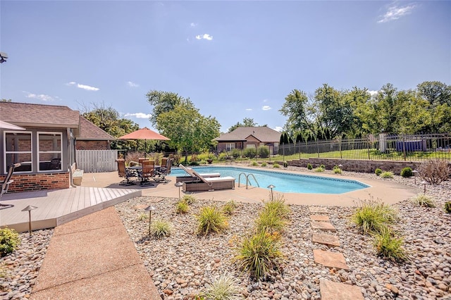 view of pool featuring a patio area