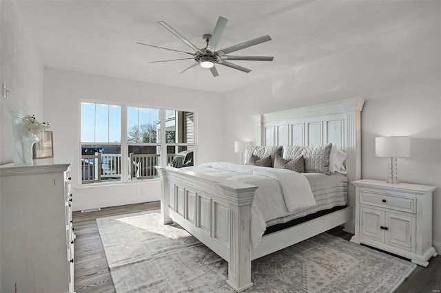 bedroom featuring ceiling fan and dark hardwood / wood-style floors