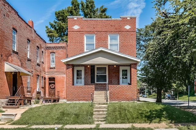 view of front facade featuring a front yard