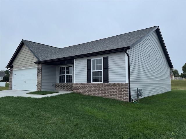 exterior space with a garage and a lawn