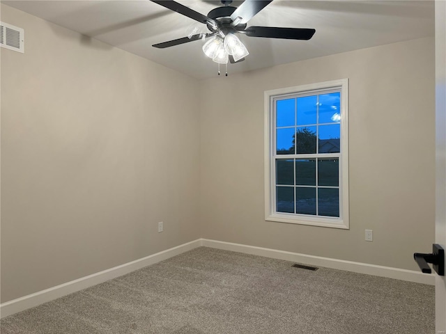 unfurnished room featuring carpet flooring and ceiling fan