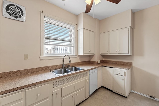 kitchen with sink, light tile patterned floors, dishwasher, ceiling fan, and white cabinets