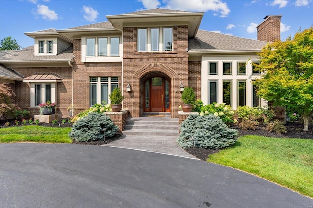 view of front of property with a front lawn