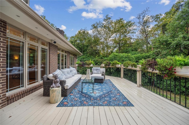 deck with an outdoor hangout area