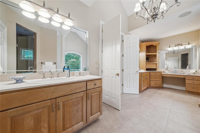 bathroom featuring tile patterned flooring, lofted ceiling, and vanity