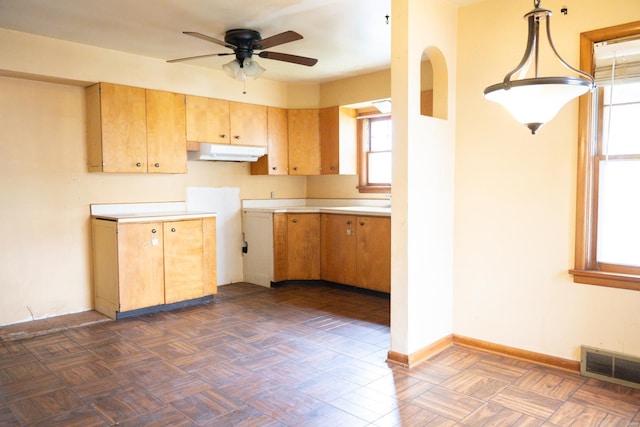 kitchen featuring hanging light fixtures, range hood, ceiling fan, and dark parquet floors