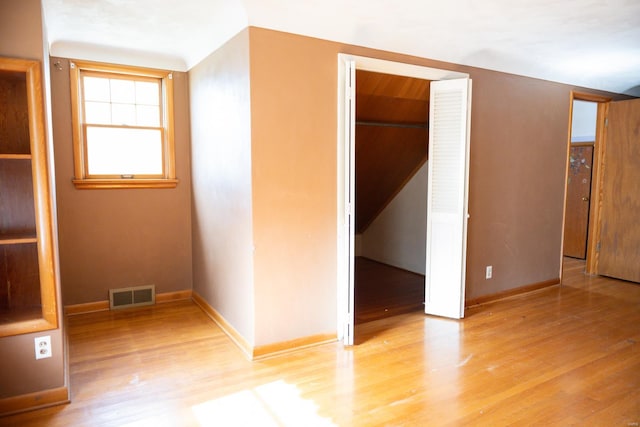 unfurnished room featuring light hardwood / wood-style floors