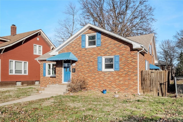 view of front of home with a front yard