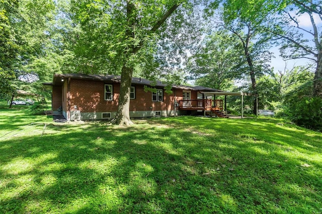 view of yard with a deck