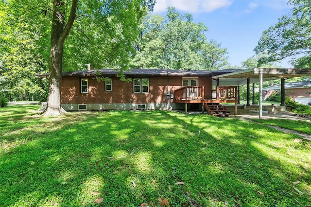 back of property with a deck and a lawn