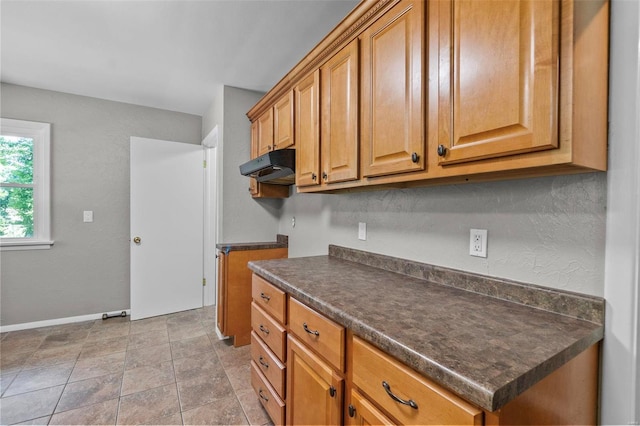 kitchen featuring light tile patterned flooring