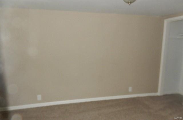 empty room with carpet floors