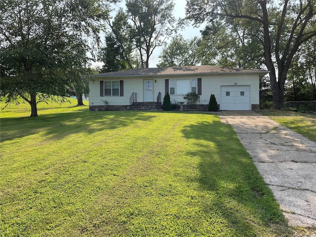 ranch-style house with a garage and a front yard