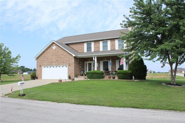 view of front of home featuring a porch, a garage, and a front yard