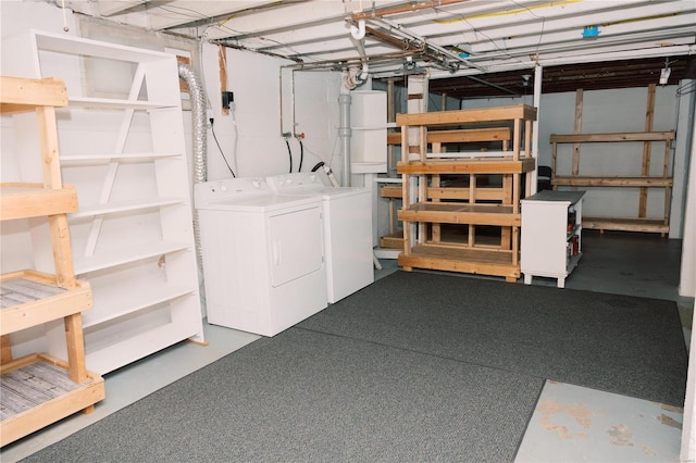 basement featuring washer and clothes dryer