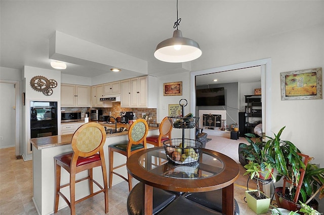 dining room featuring sink