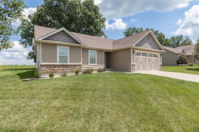 craftsman inspired home with a garage and a front lawn