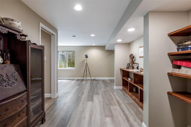 hallway with light wood-type flooring