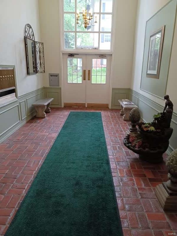 interior space featuring a chandelier