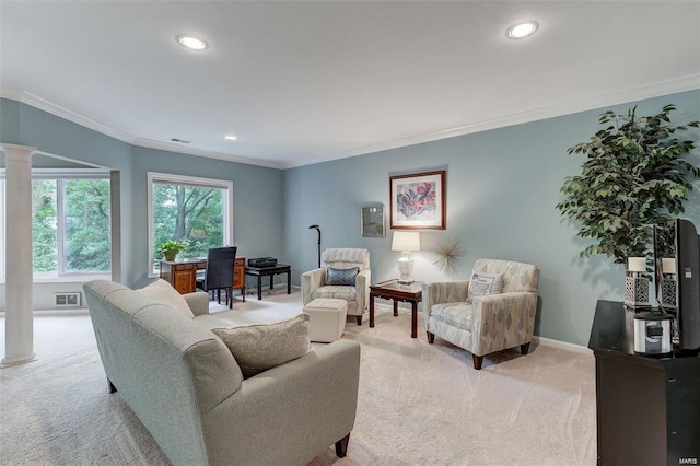 living room featuring crown molding, decorative columns, and light colored carpet