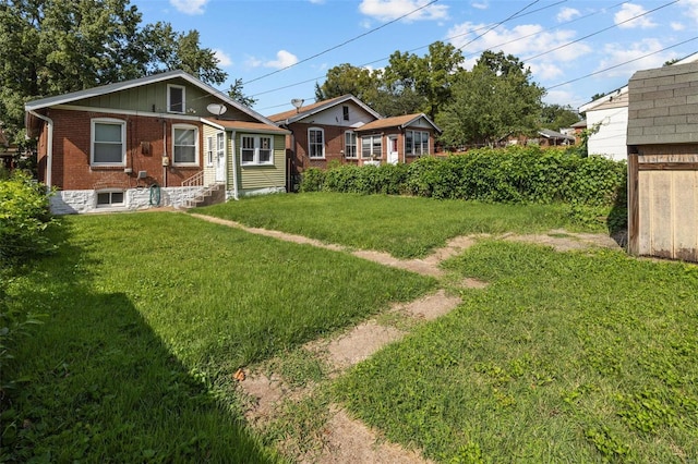 exterior space with a lawn