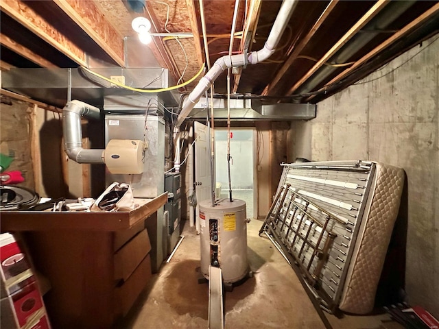 utility room featuring water heater