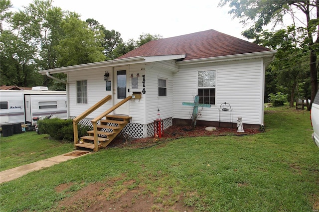 view of front of house with a front lawn