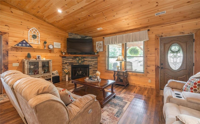 living room featuring wooden walls, a fireplace, wood-type flooring, lofted ceiling, and wood ceiling