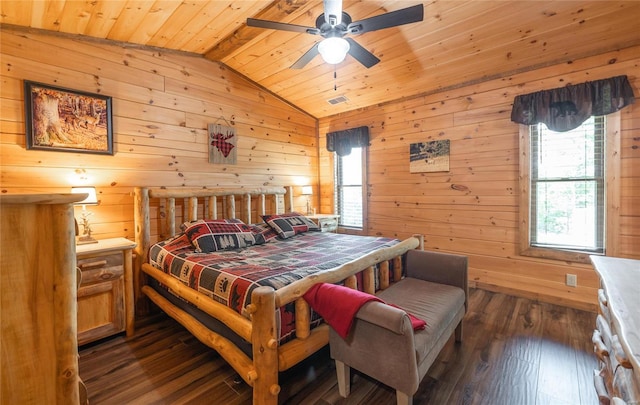 bedroom with wood ceiling, dark wood-type flooring, vaulted ceiling, and wooden walls