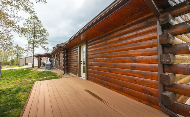 wooden terrace with a lawn and central AC