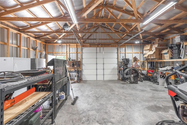 garage featuring a workshop area