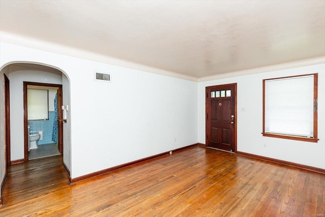 interior space with hardwood / wood-style floors