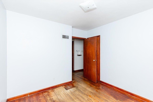 unfurnished room featuring light hardwood / wood-style flooring