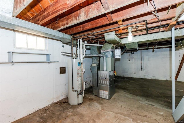 basement featuring heating unit and gas water heater