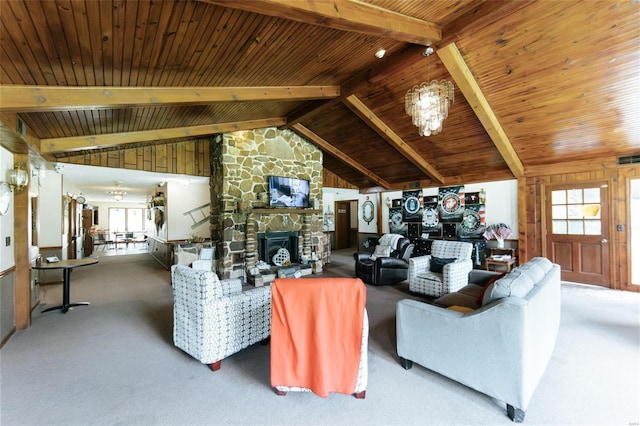 living room with beam ceiling, carpet flooring, wooden ceiling, a fireplace, and high vaulted ceiling