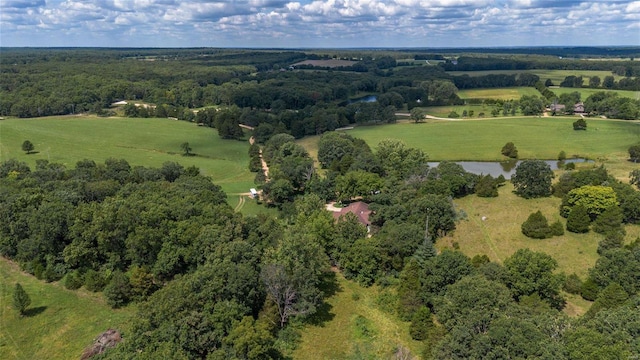 birds eye view of property with a rural view