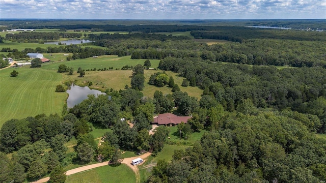 birds eye view of property with a rural view and a water view