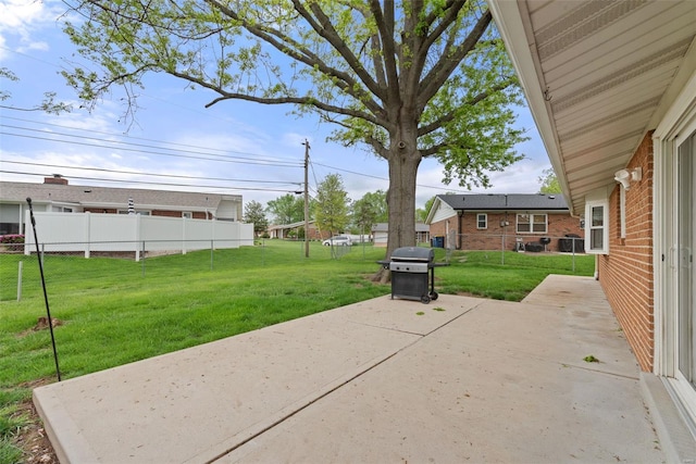 view of patio / terrace featuring fence and grilling area
