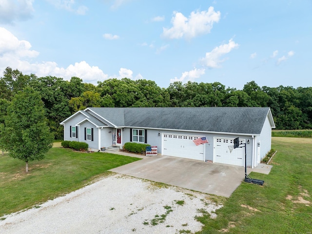 single story home with driveway, a shingled roof, and a front yard