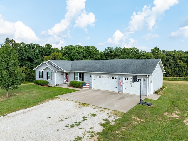 ranch-style house featuring an attached garage, roof with shingles, driveway, and a front lawn