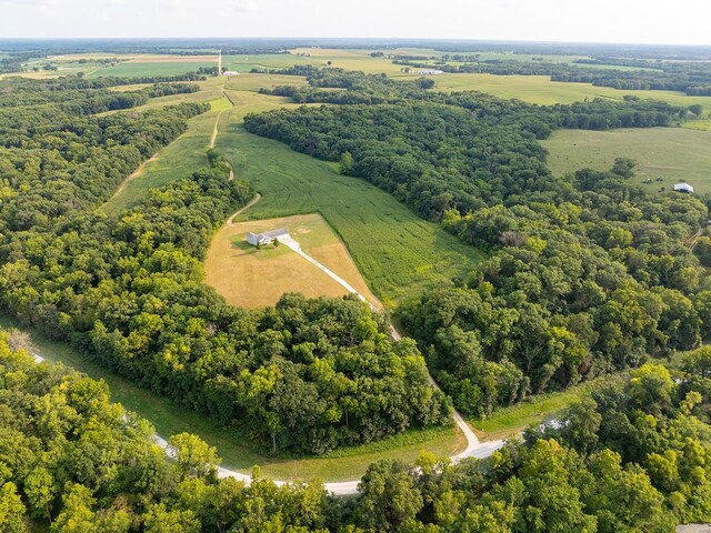 birds eye view of property featuring a rural view