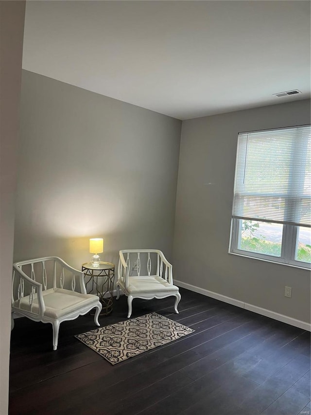 bedroom featuring dark wood-type flooring